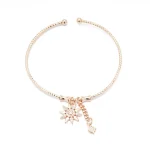 Yıldız Motifli Altın Rengi Kelepçe Bilezik